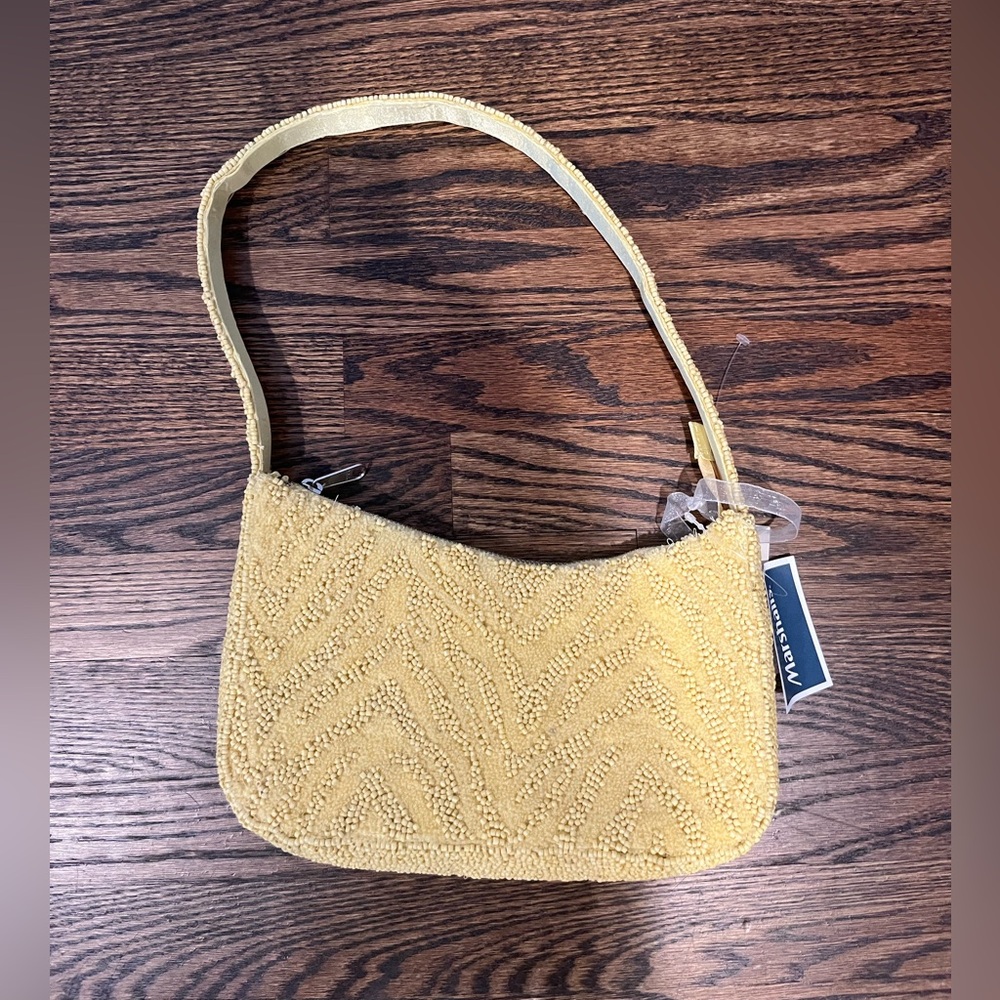 Marshall’s Yellow Shoulder Bag with Textured Design